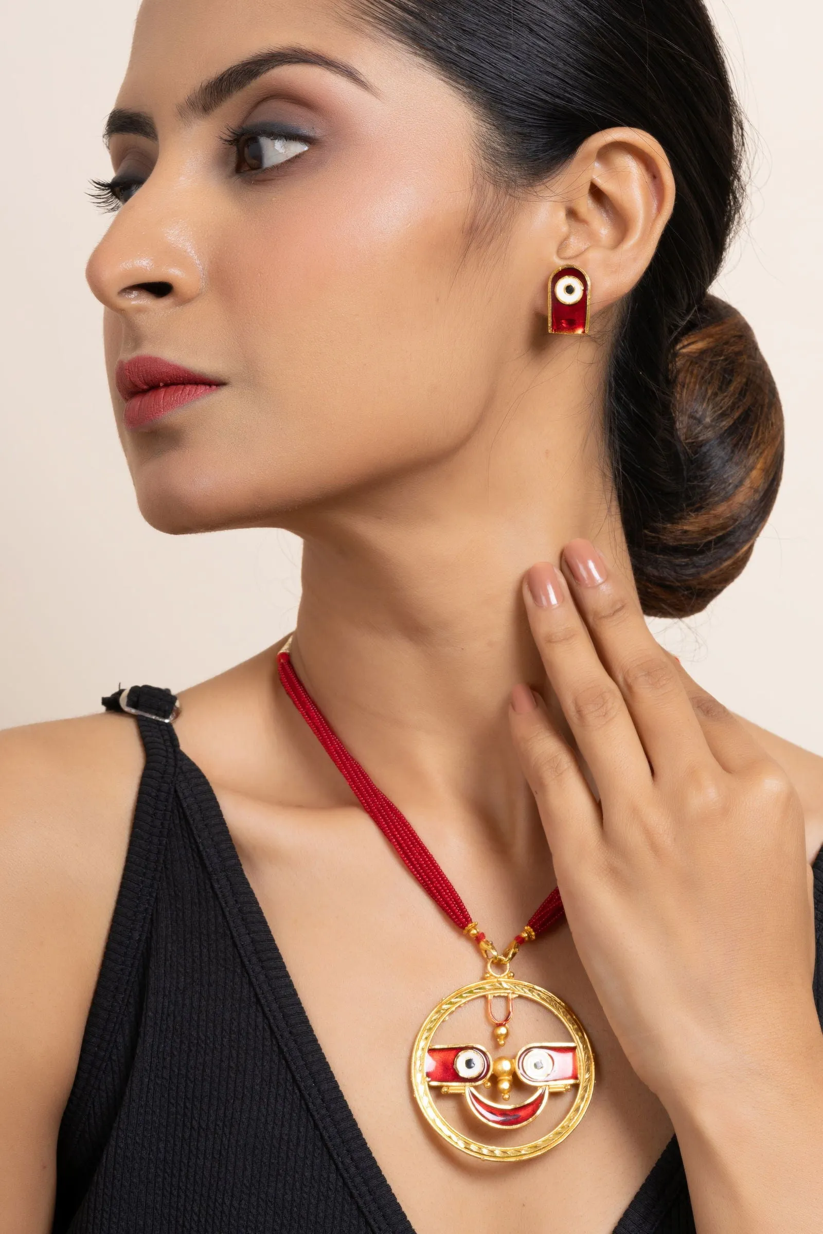 Gold Plated Meenakari Round Jagannath Pendant Necklace with Matching Earrings & Red Tussle Jewelry Set